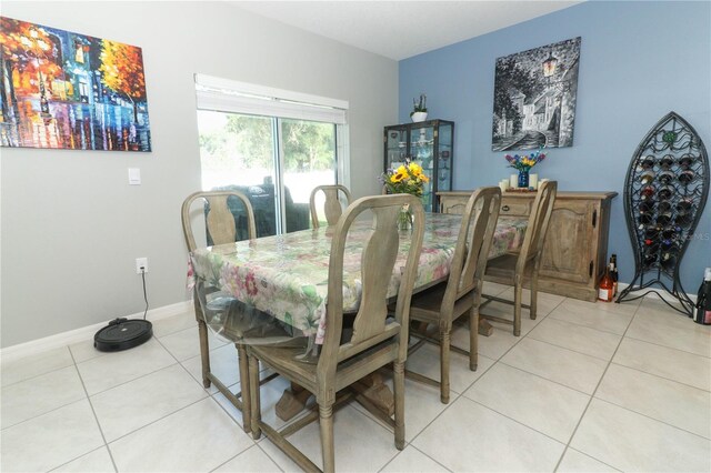 view of tiled dining space