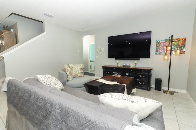 living room with light tile patterned floors