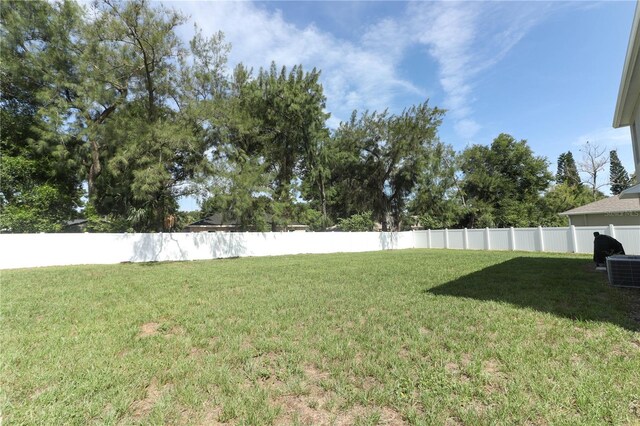 view of yard featuring central AC unit