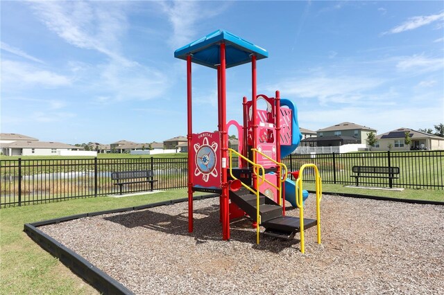 view of play area featuring a yard