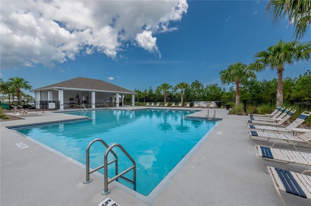 view of pool featuring a patio