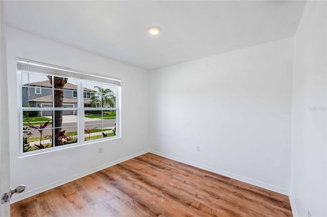 2950 Gibraltar Blvd, New Smyrna Beach, FL 32168 - spare room with wood finished floors and baseboards