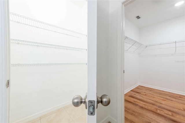 2950 Gibraltar Blvd, New Smyrna Beach, FL 32168 - spacious closet featuring light wood-style flooring and visible vents