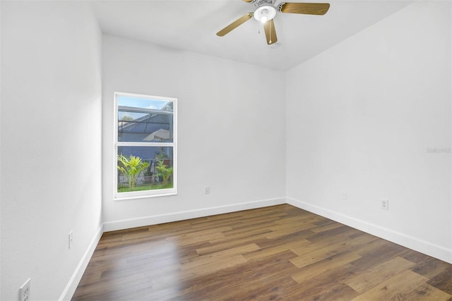 empty room featuring hardwood / wood-style flooring and ceiling fan