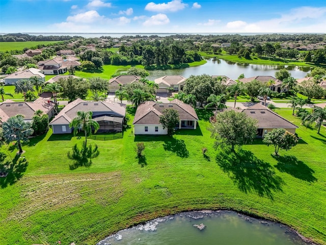 drone / aerial view with a water view