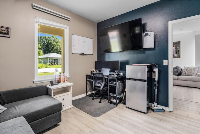 office area with light wood-type flooring