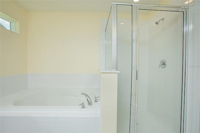 bathroom with independent shower and bath