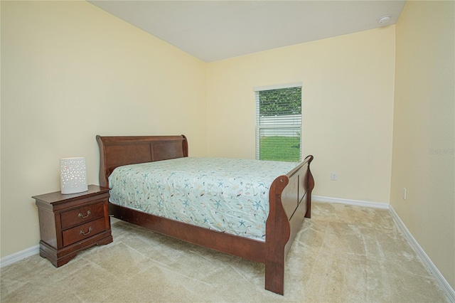 bedroom with light carpet