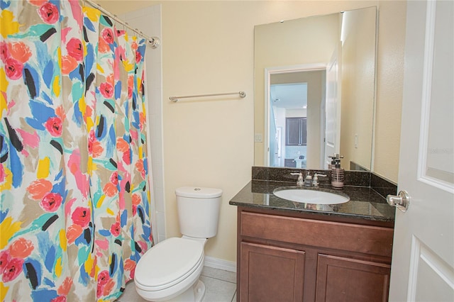 bathroom featuring vanity, walk in shower, tile patterned floors, and toilet