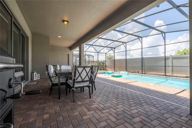 sunroom / solarium with a healthy amount of sunlight and a swimming pool