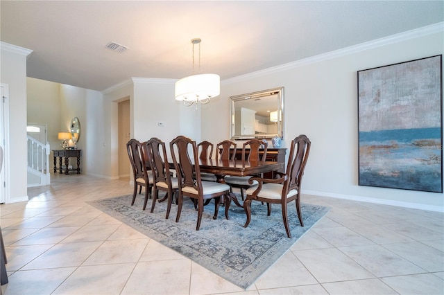 dining area featuring light tile patterned flooring, an inviting chandelier, and ornamental molding