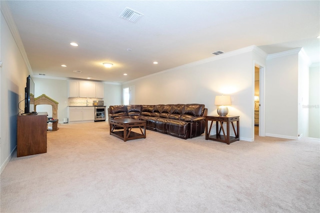 carpeted living room with crown molding and wine cooler