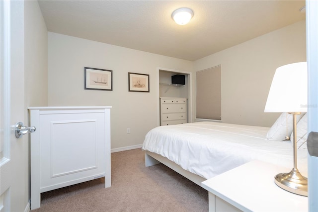 bedroom featuring carpet