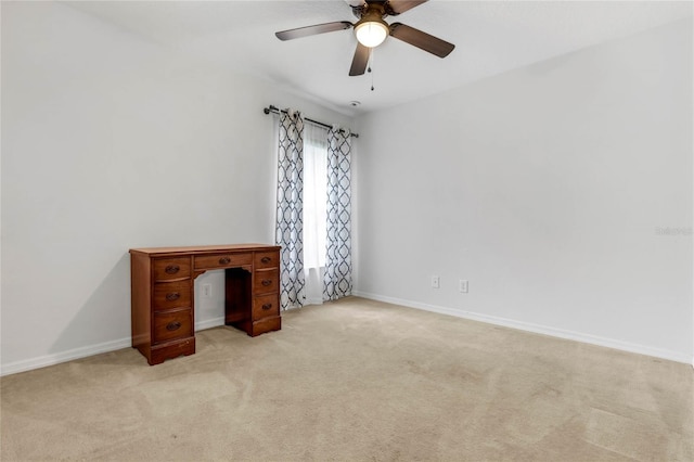 unfurnished bedroom featuring ceiling fan and light colored carpet