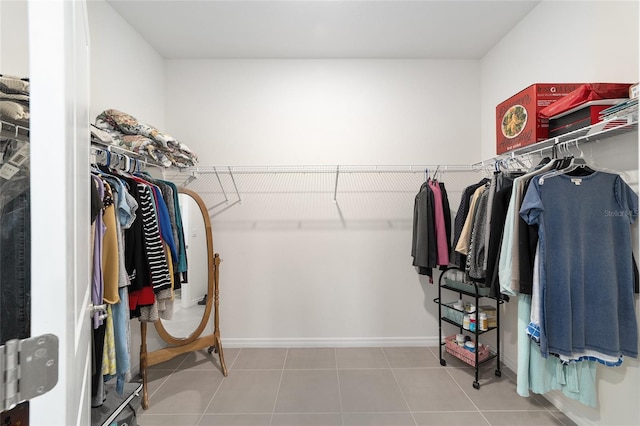 walk in closet featuring tile patterned floors