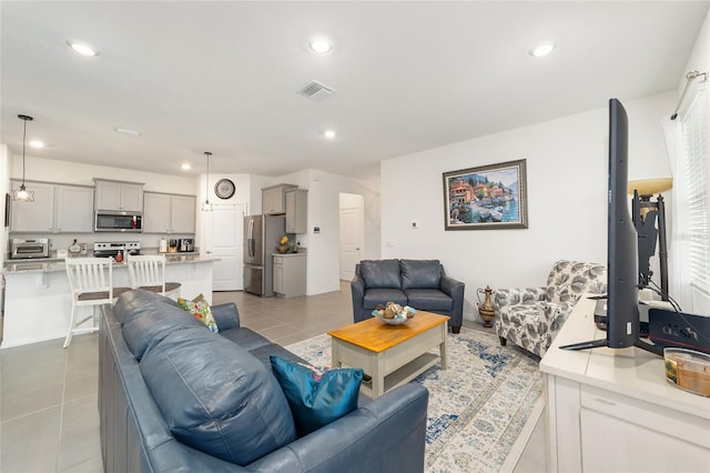 living room featuring light tile patterned flooring