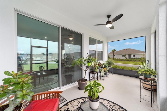 sunroom / solarium with ceiling fan