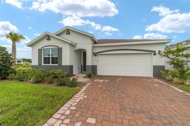 single story home featuring a garage