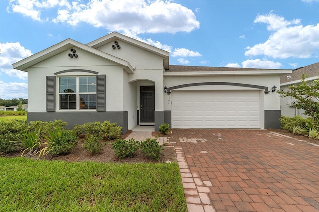 ranch-style home with a garage