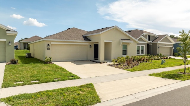 view of front facade featuring central AC unit, a garage, and a front lawn