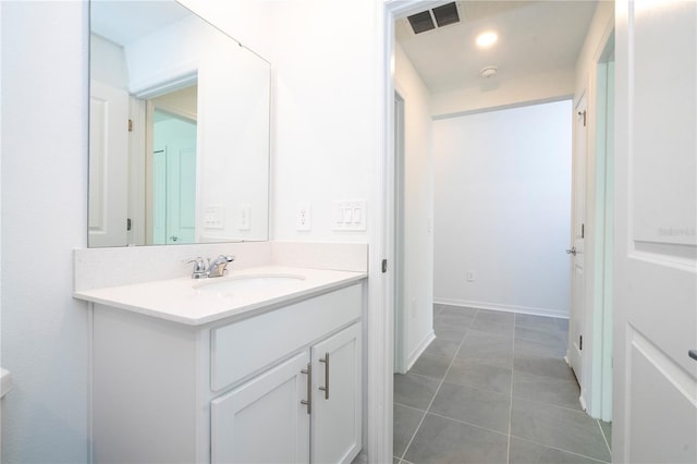 bathroom featuring vanity and tile patterned flooring