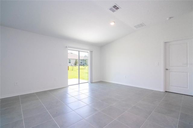 view of tiled spare room