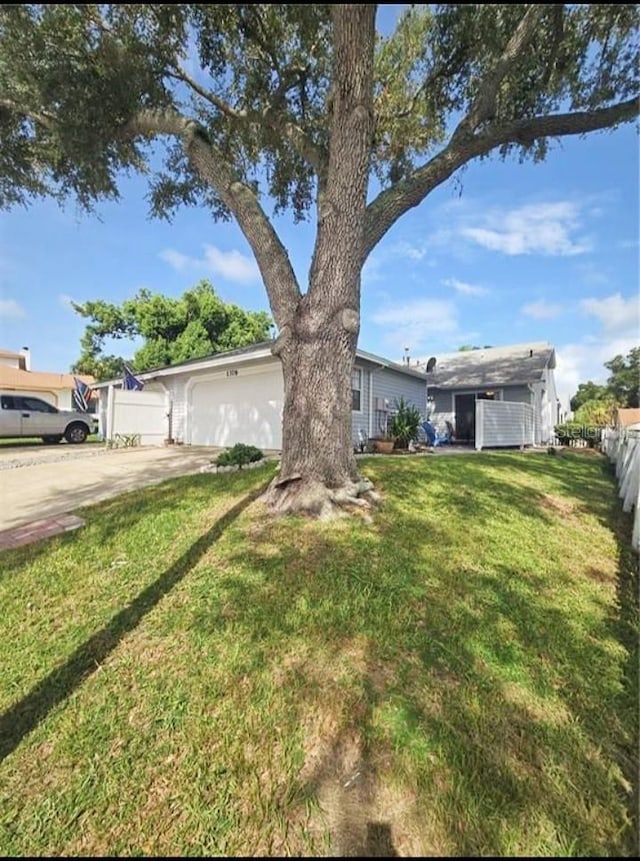 view of yard featuring a garage