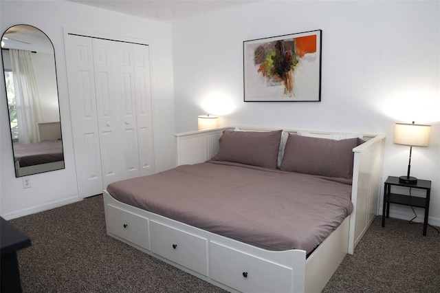 carpeted bedroom featuring a closet