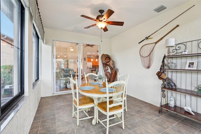 dining room with ceiling fan