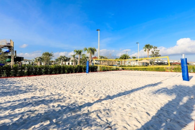 view of home's community featuring volleyball court