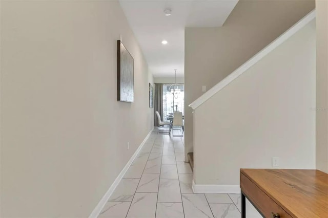 hallway with light tile patterned floors