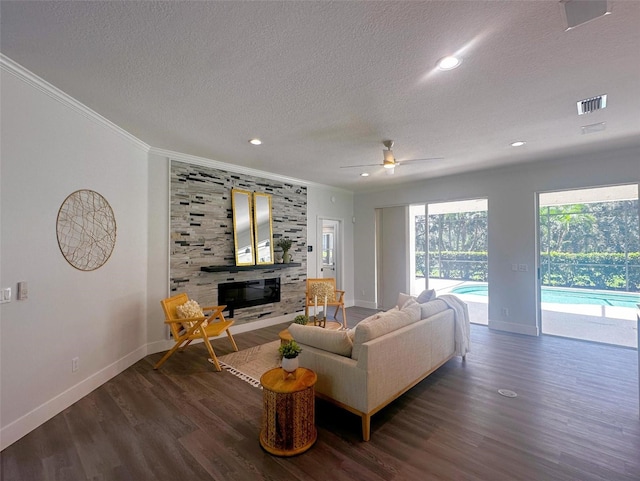 living room with dark hardwood / wood-style floors and a textured ceiling