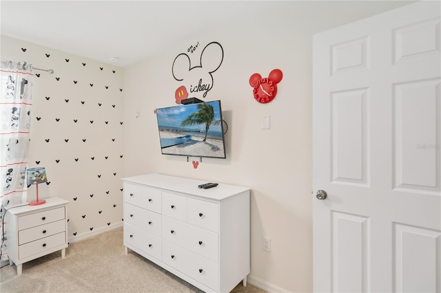 bedroom with light colored carpet