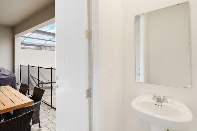 bathroom with tile patterned floors and sink