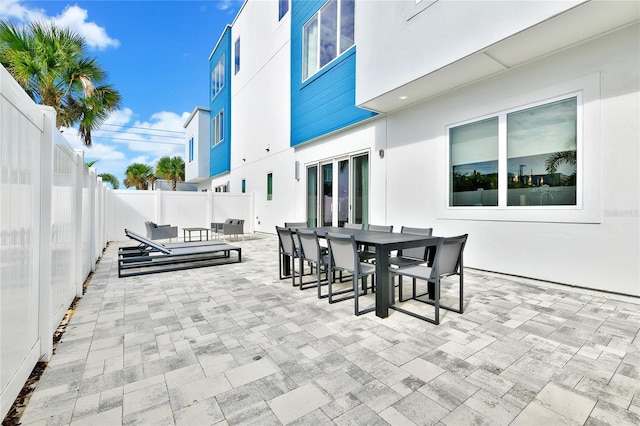 view of patio / terrace with outdoor dining space and a fenced backyard