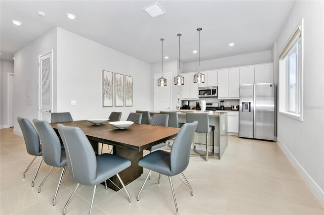 view of tiled dining space