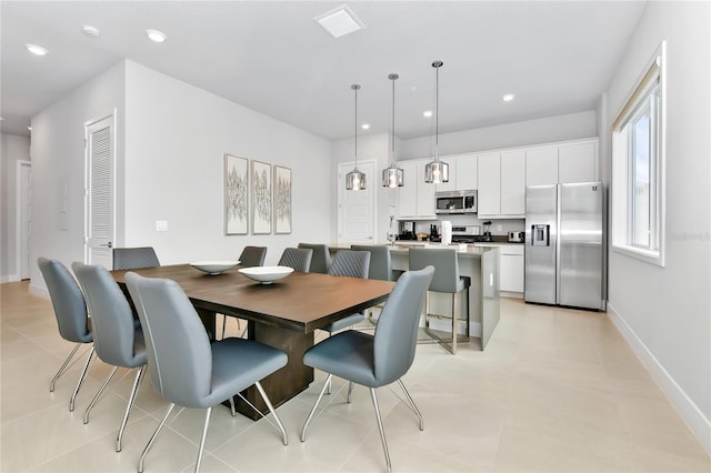 dining space with visible vents, recessed lighting, and baseboards