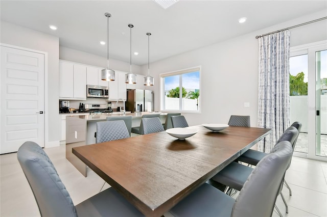 dining room with recessed lighting and visible vents