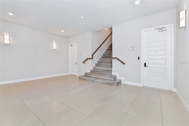 entrance foyer featuring light tile patterned floors