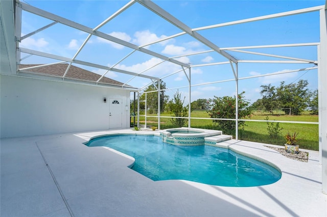 view of swimming pool with a lanai, a patio, and an in ground hot tub