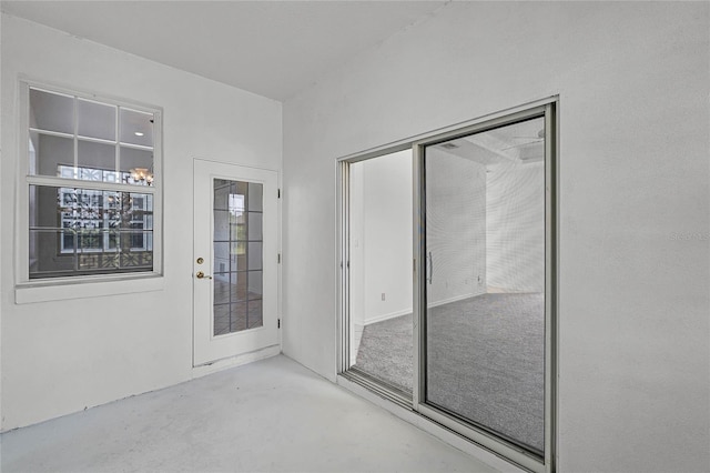 doorway to property featuring a patio area