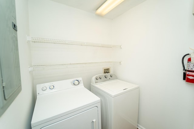 laundry room featuring washing machine and dryer