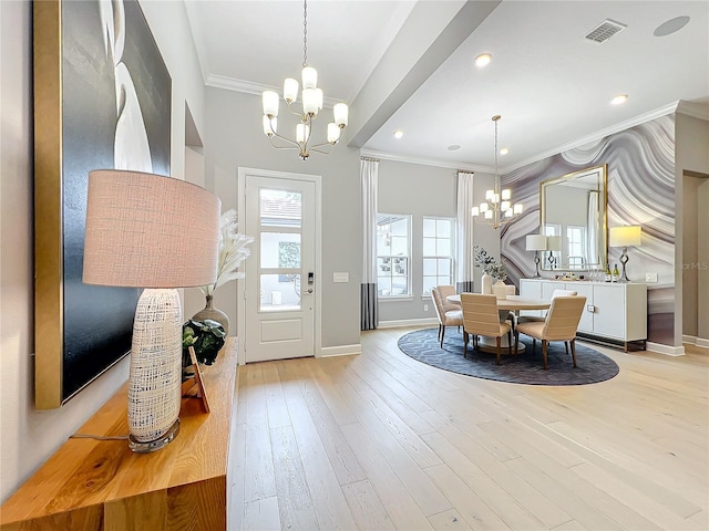 10193 Brocksport Cir, Gotha, FL 34734 - entryway with a chandelier, ornamental molding, light wood finished floors, and recessed lighting