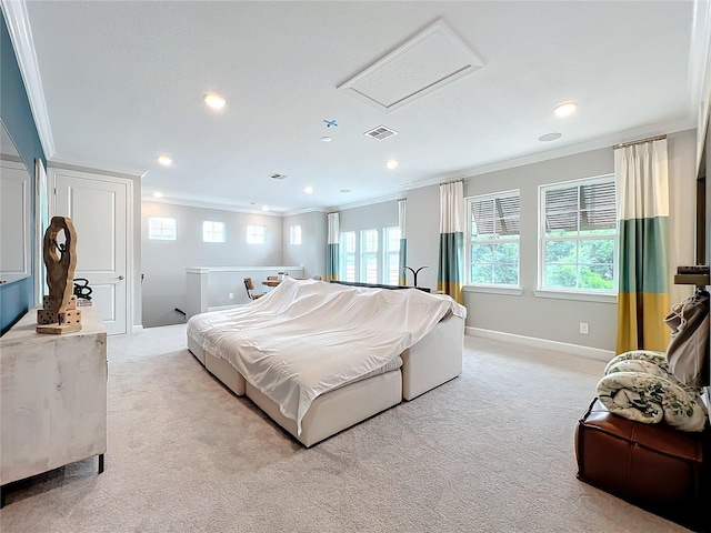 carpeted bedroom with ornamental molding and multiple windows