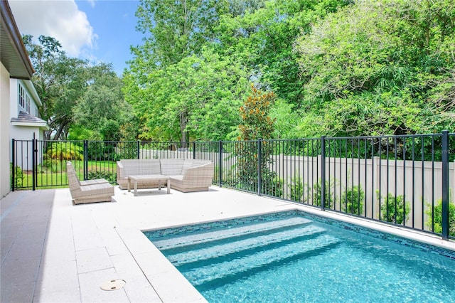 view of pool featuring a patio area and outdoor lounge area