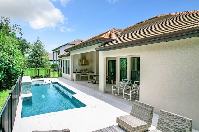 view of swimming pool with a patio