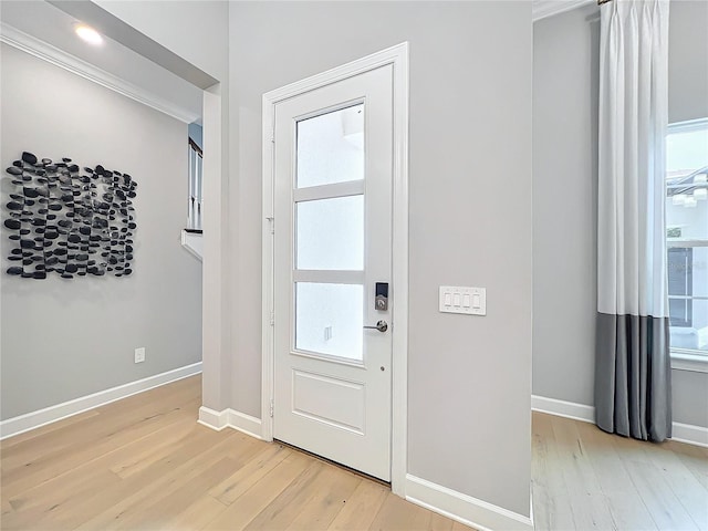 10193 Brocksport Cir, Gotha, FL 34734 - foyer with light wood-type flooring and baseboards