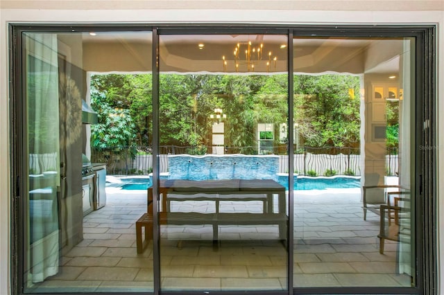 10193 Brocksport Cir, Gotha, FL 34734 - doorway featuring a chandelier