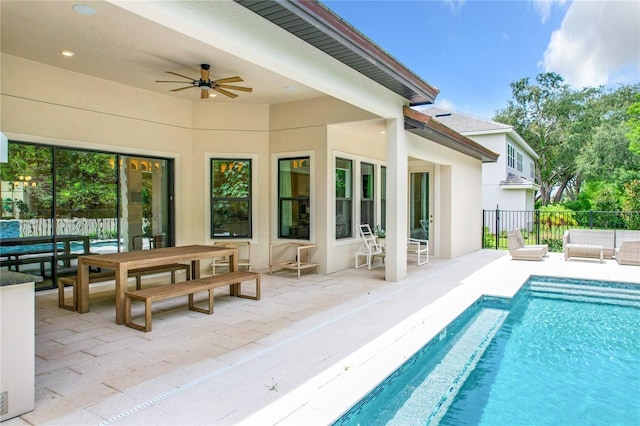 10193 Brocksport Cir, Gotha, FL 34734 - view of swimming pool featuring a patio, ceiling fan, and an outdoor hangout area