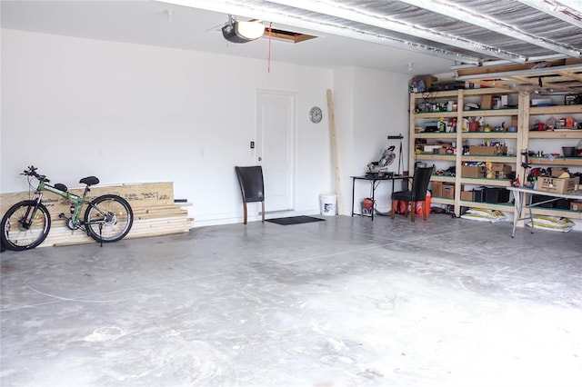 garage featuring a garage door opener